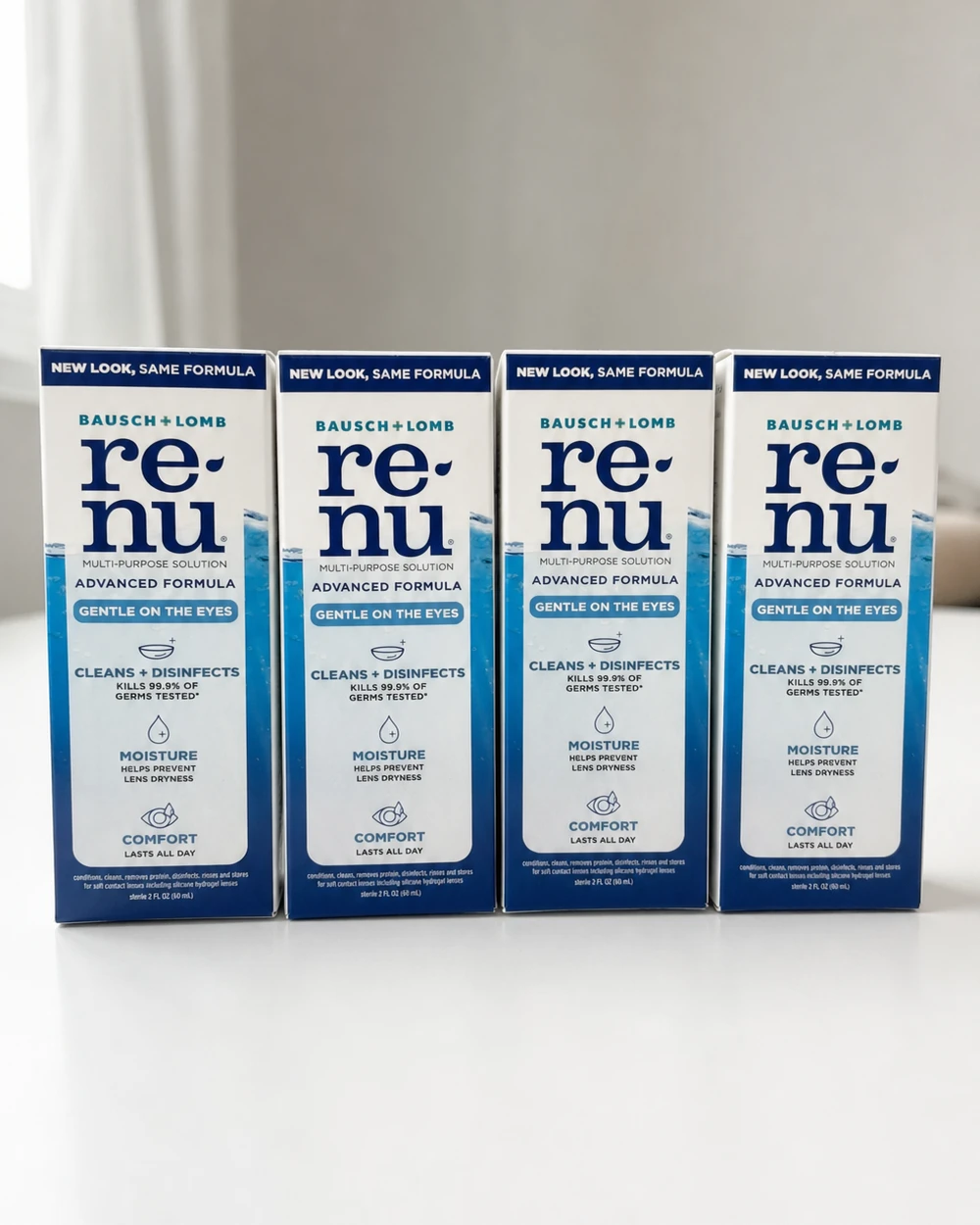 Kit com quatro frascos de solução Renu Fresh para lentes de contato